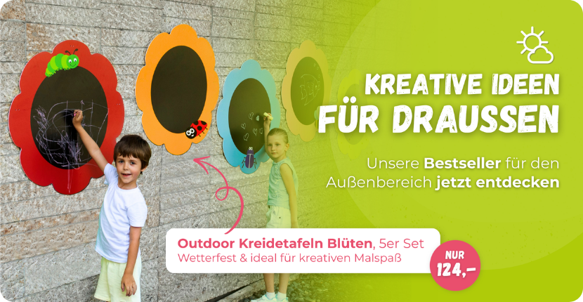 Kinder malen an bunten Outdoor-Kreidetafeln in Blütenform für kreativen Spielspaß draußen
