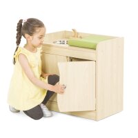 Puppen-Wickeltisch Kind kniiend