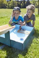 Wellenspieler Kinder am Becken