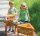 Activity Spielboard Siebe und Schüssel mit Kind